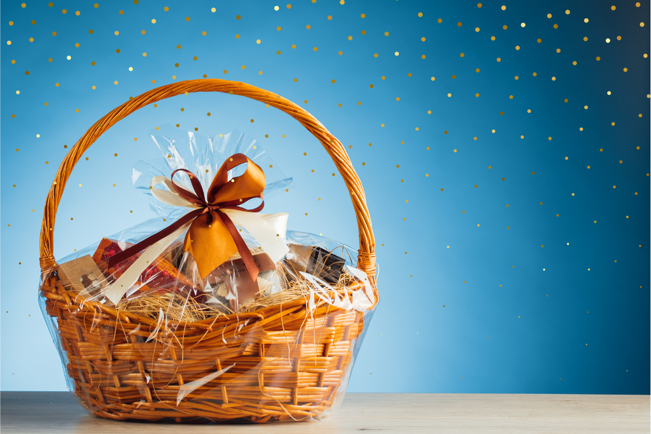 gift basket with a blue background and gold sparkles